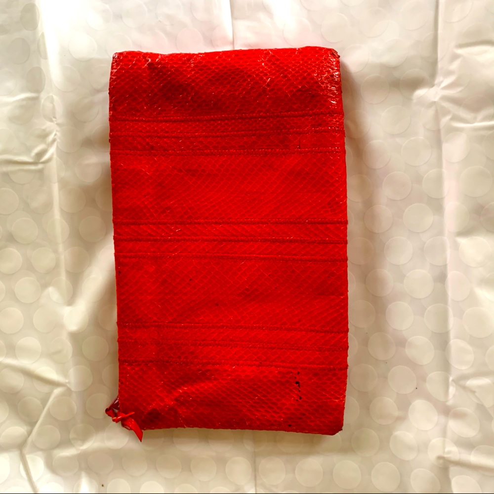 Faux red snakeskin clutch